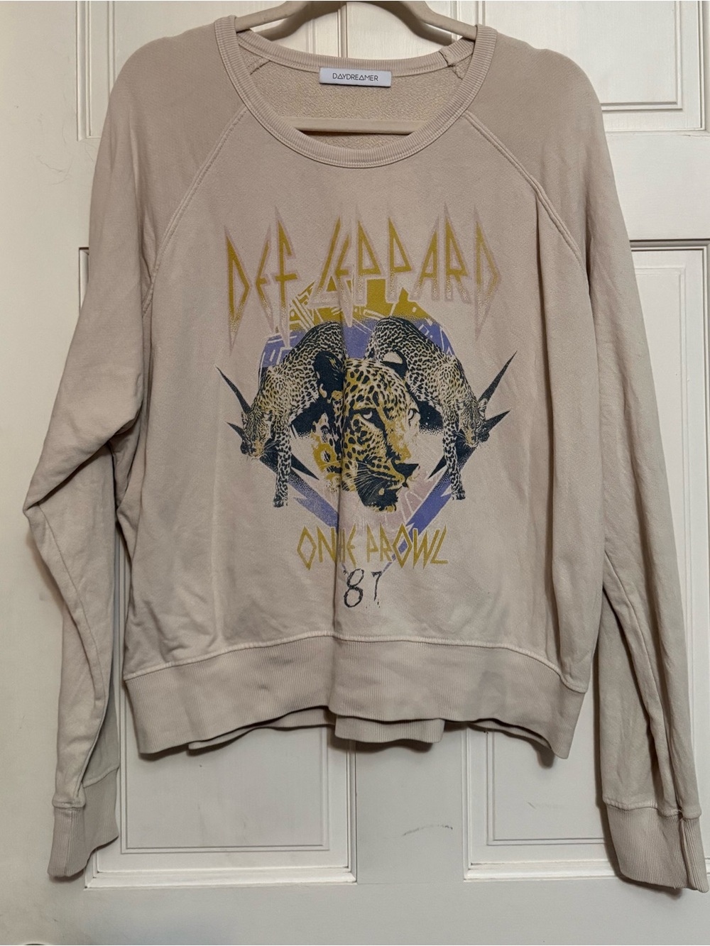 Daydreamer Beige Crewneck Sweatshirt with Graphic Def Leopard Print